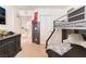Comfortable bedroom with a bunk bed, dresser, and decor, offering a cozy space at 4129 Chamisa Cove St, Las Vegas, NV 89115