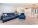 Upstairs living room with neutral color scheme, comfortable seating, and a relaxing atmosphere at 4129 Chamisa Cove St, Las Vegas, NV 89115