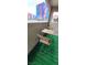 Cozy balcony space with synthetic turf and views of the city skyline at 4200 S Valley View Blvd # 3078, Las Vegas, NV 89103