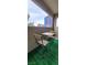 Balcony featuring green synthetic turf and views of the city skyline at 4200 S Valley View Blvd # 3078, Las Vegas, NV 89103