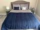 Comfortable bedroom with a plush bed, neutral colors, and stylish bedside tables at 4200 S Valley View Blvd # 3078, Las Vegas, NV 89103