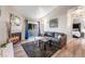 Comfortable living room featuring a fireplace, balcony, and an inviting aesthetic at 4200 S Valley View Blvd # 3078, Las Vegas, NV 89103
