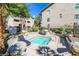 Outdoor spa with rock landscaping and comfortable lounge chairs for community residents at 4200 S Valley View Blvd # 3078, Las Vegas, NV 89103
