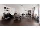 Spacious living room boasts hardwood floors and ample room for entertaining, with a small entertainment center at 4509 Paseo Del Ray Dr, Las Vegas, NV 89121