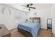 Comfortable bedroom featuring a ceiling fan and neutral decor at 4612 Townwall St, Las Vegas, NV 89115