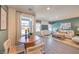 Inviting living room features stylish furniture, decor, and abundant natural light at 5027 Sage Mesa Ave # Lot 141, Las Vegas, NV 89139