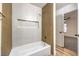 This bathroom has modern design, showcasing a luxurious bathtub and stylish tile work at 5101 Village Dr, Las Vegas, NV 89142