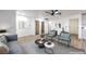 Bright living room with modern decor featuring hardwood floors, contemporary furniture and neutral color palette at 5101 Village Dr, Las Vegas, NV 89142