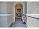 Inviting front entryway with a decorative wreath, wood door, and 'Welcome' sign at 6325 Gambetta St, Las Vegas, NV 89115