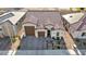 Inviting single-story home featuring a well-manicured yard and a two-car garage at 6325 Gambetta St, Las Vegas, NV 89115