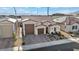 Charming single-story home featuring a well-manicured yard and a two-car garage at 6325 Gambetta St, Las Vegas, NV 89115