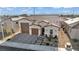 Charming single-story home featuring a well-manicured yard and a two-car garage at 6325 Gambetta St, Las Vegas, NV 89115