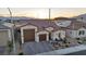 Inviting single-story home with a three-car garage and nicely landscaped front yard at 6325 Gambetta St, Las Vegas, NV 89115