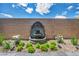 Unique backyard water fountain surrounded by plants and decorative rock at 6325 Gambetta St, Las Vegas, NV 89115