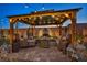 Comfortable gazebo with chairs, sofas, and an ornate fountain providing a relaxing outdoor retreat at 6325 Gambetta St, Las Vegas, NV 89115