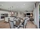 Spacious open-concept area with a dining area connecting to the kitchen and the living room at 6325 Gambetta St, Las Vegas, NV 89115