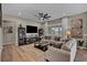 Cozy living room featuring a comfortable sofa, modern decor, and neutral tones at 6325 Gambetta St, Las Vegas, NV 89115