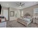 Serene main bedroom featuring a plush bed, soft lighting, and tasteful decor for a restful retreat at 6325 Gambetta St, Las Vegas, NV 89115