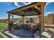 Inviting outdoor patio with comfortable seating, a decorative fountain, and lush landscaping, perfect for relaxation at 6325 Gambetta St, Las Vegas, NV 89115