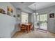 Charming dining area with a breakfast table and sliding glass doors to the patio at 6868 Sky Pointe Dr # 1089, Las Vegas, NV 89131
