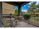 Cozy covered patio with chairs and table, perfect for enjoying the outdoors at 6868 Sky Pointe Dr # 1089, Las Vegas, NV 89131