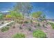 Scenic community park featuring manicured landscaping, walking trails, and a peaceful environment at 764 Aurora Vale Pl, Henderson, NV 89011