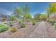 Picturesque park with lush landscaping, winding walkways, and serene atmosphere for relaxation at 764 Aurora Vale Pl, Henderson, NV 89011