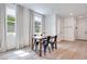 Cozy dining area featuring tile floors, contemporary furnishings and lots of natural light at 764 Aurora Vale Pl, Henderson, NV 89011