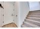 Inviting entryway featuring a staircase and neutral color palette at 764 Aurora Vale Pl, Henderson, NV 89011