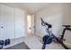 Well-equipped exercise area with bike and ample workout space at 764 Aurora Vale Pl, Henderson, NV 89011