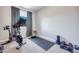 Home gym area featuring exercise equipment and a workout mat at 764 Aurora Vale Pl, Henderson, NV 89011