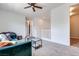 Spacious living room with plush seating, carpet, and an inviting atmosphere at 764 Aurora Vale Pl, Henderson, NV 89011