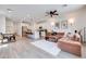 Open-concept living room features a spacious layout, contemporary decor and plenty of natural light at 764 Aurora Vale Pl, Henderson, NV 89011
