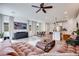 Comfortable living room showcasing an open layout, sleek furnishings, and lots of natural light at 764 Aurora Vale Pl, Henderson, NV 89011