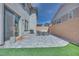 Spacious patio with pavers, perfect for outdoor dining and relaxation with artificial turf at 764 Aurora Vale Pl, Henderson, NV 89011