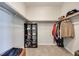 Well-organized walk-in closet with shelving, hanging rods, and space for shoes and accessories at 764 Aurora Vale Pl, Henderson, NV 89011