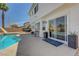An extended patio area offers space for lounging and entertaining, just steps from the refreshing pool at 7726 Keating Cir, Las Vegas, NV 89147