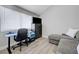 Cozy bedroom area with a large window for natural light at 7726 Keating Cir, Las Vegas, NV 89147