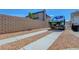 An extra wide driveway offers boat parking, additional parking, and easy access to the property at 7726 Keating Cir, Las Vegas, NV 89147
