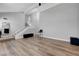 Open concept living space featuring hardwood floors and modern staircase at 7726 Keating Cir, Las Vegas, NV 89147