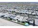 Extensive aerial view of a modern neighborhood; houses with unique designs and small turf backyards at 787 Willits St, Las Vegas, NV 89138