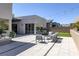 Charming backyard with an expansive patio, comfortable outdoor furniture, and well-manicured landscaping at 787 Willits St, Las Vegas, NV 89138