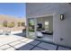 Open sliding glass door reveals the main bedroom from the patio area at 787 Willits St, Las Vegas, NV 89138