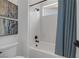This bathroom has a shower-tub combo with white subway tile and modern fixtures at 787 Willits St, Las Vegas, NV 89138