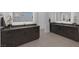 Modern bathroom featuring dual vanities, providing ample space and convenience for daily routines at 787 Willits St, Las Vegas, NV 89138