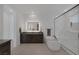 Modern bathroom with a sleek vanity, soaking tub, and a glass-enclosed shower, offering relaxation at 787 Willits St, Las Vegas, NV 89138