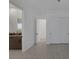 Simple bedroom with a peek into the bathroom at 787 Willits St, Las Vegas, NV 89138