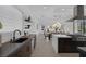 Gourmet kitchen featuring sleek countertops, modern appliances, and easy access to the dining area at 787 Willits St, Las Vegas, NV 89138