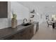 Stylish kitchen features sleek countertops, stainless steel appliances, and view to the dining area at 787 Willits St, Las Vegas, NV 89138