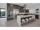 Spacious kitchen features a large island with seating, stainless steel appliances, and modern cabinetry at 787 Willits St, Las Vegas, NV 89138